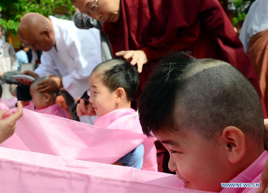 SOUTH KOREA-PUSAN-BOY MONK-HAIRCUT