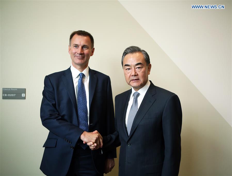 UN-CHINA-WANG YI-BRITAIN-FOREIGN SECRETARY-JEREMY HUNT-MEETING