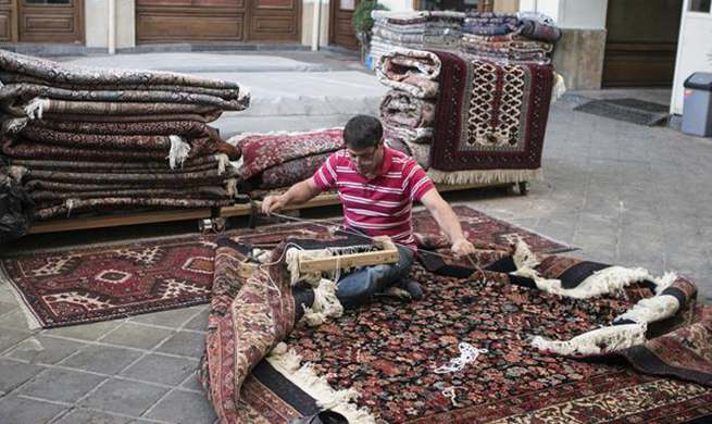 Iran to sue U.S. for banning imports of handwoven Iranian rugs