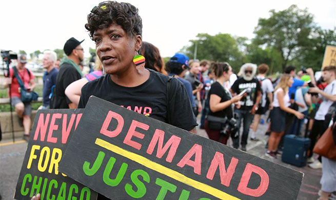 Anti-violence protesters march over police misconduct in Chicago