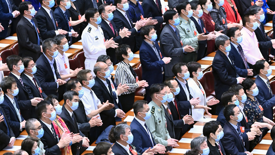 全国政协十三届三次会议举行闭幕会